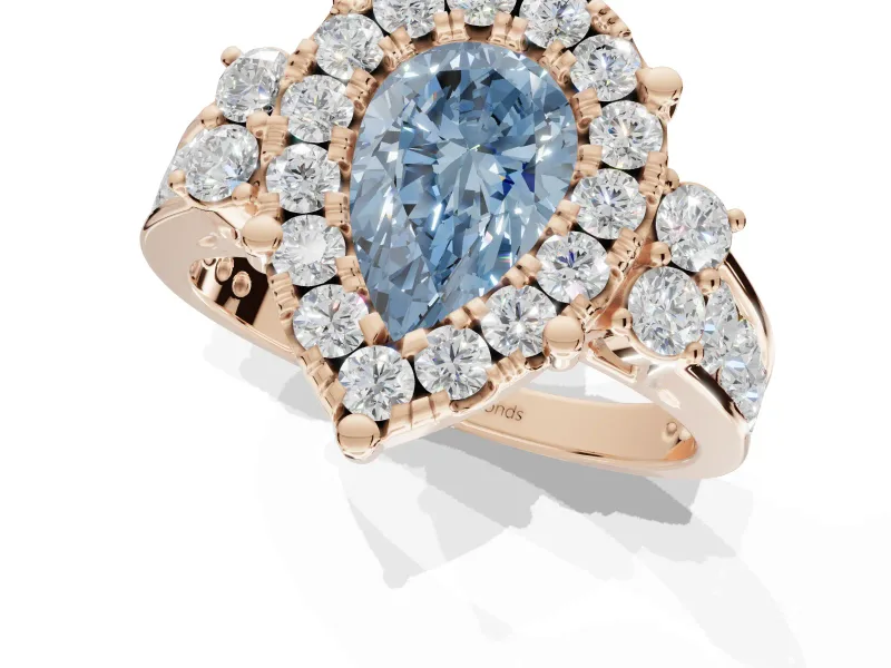Pear-Shaped Halo Engagement Ring Setting for a Fancy Blue Lab-Grown Diamond | Graduated Channel Band | Rose Gold