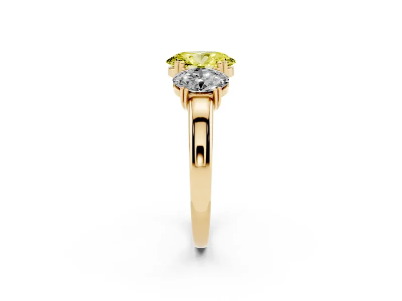 Fancy Yellow Oval Cut Diamond Three-Stone Ring Set in Yellow gold with Polished Band and Prong Setting