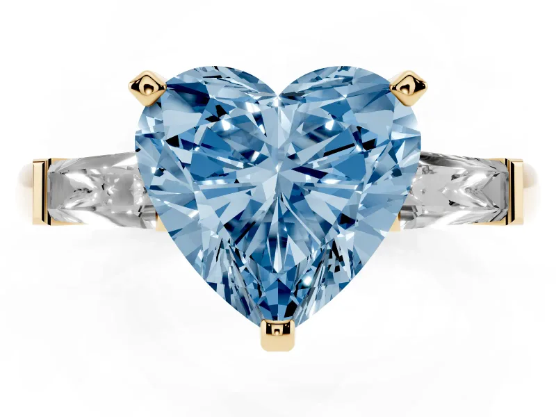 Fancy Blue Heart Cut Diamond Solitaire Ring Set in Yellow gold with Tapered Baguette Side Stones and Prong Setting