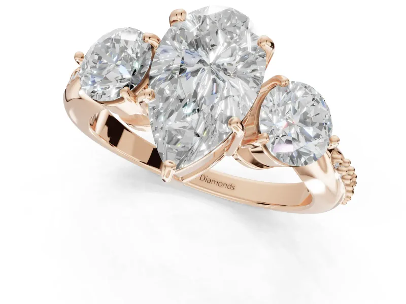 Pear-Shaped Three Stone Engagement Ring Setting | Tapered Pave Band | Rose Gold