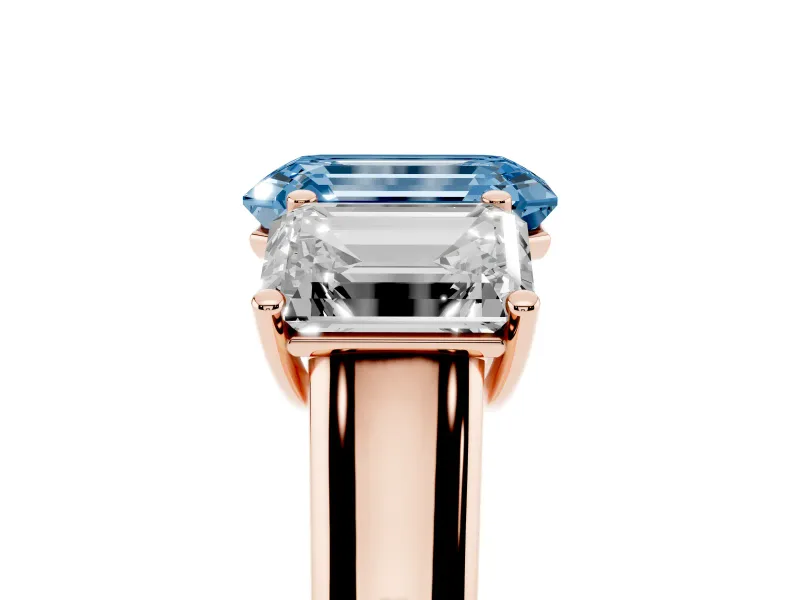 Emerald Cut Three Stone Engagement Ring Setting for a Fancy Blue Lab-Grown Diamond | Basket Prong Heads | Rose Gold