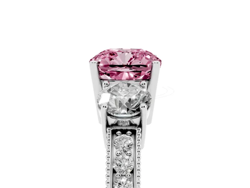 Fancy Pink Cushion Cut Diamond Three-Stone Ring Set in White gold with Round Side Stones and Pavé Band