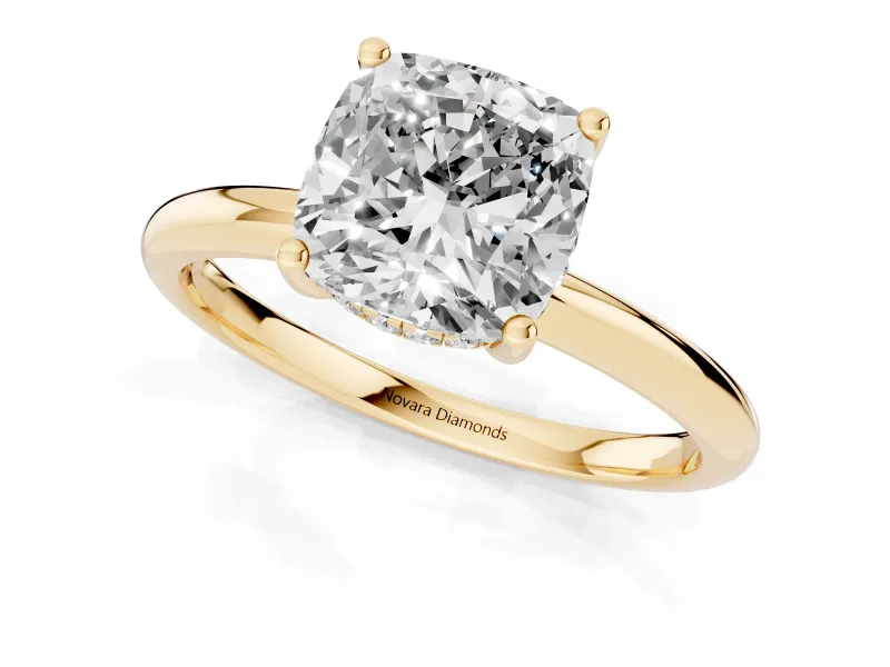 Cushion Cut Diamond Solitaire Engagement Ring Set in Yellow gold with Prong Setting and Polished Band