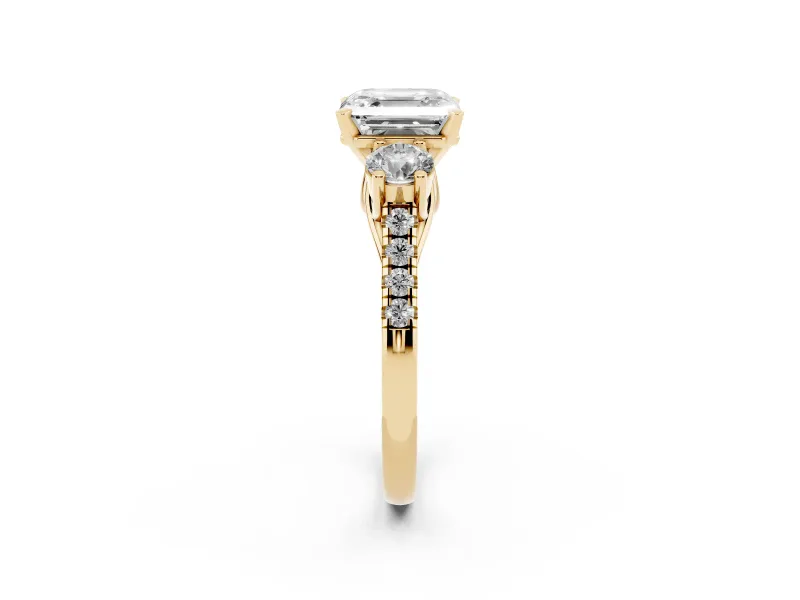 Three-Stone Asscher Cut Diamond Pavé Band Ring Set in Yellow gold with Prong-Set Trio