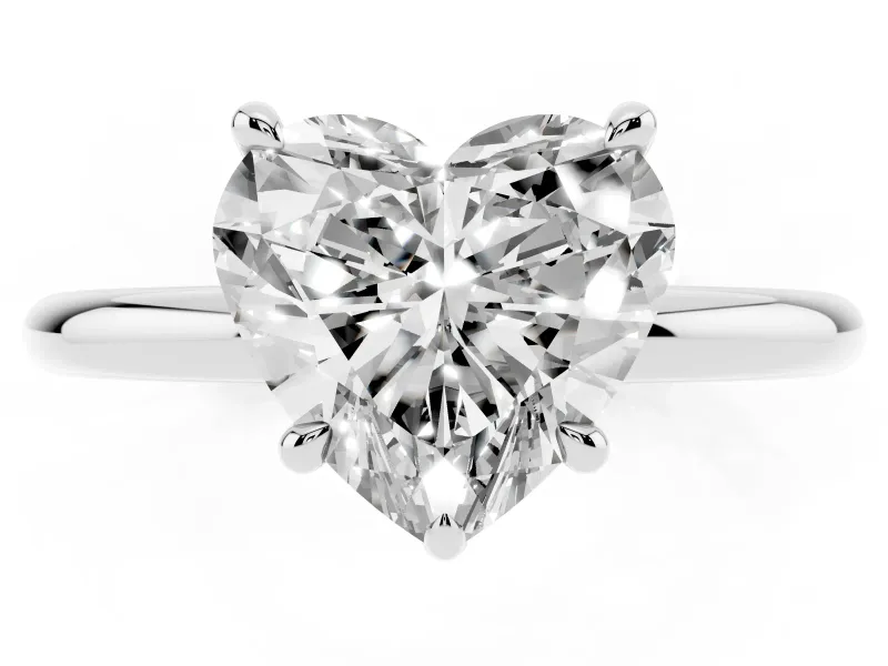 Heart Cut Diamond Solitaire Ring Set in Silver with Thin Band and Prong Setting