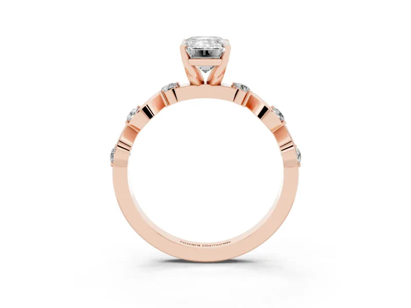Emerald Cut Diamond Solitaire Ring Set in Rose gold with Ribbon Twist Band, Round Accents and Prong Setting