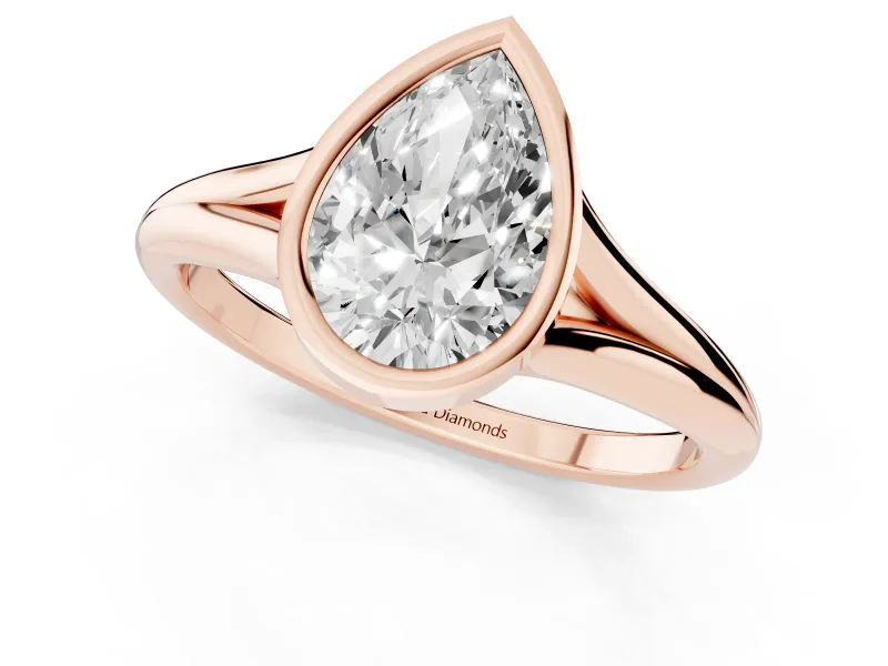 Bezel Set Pear Cut Diamond Solitaire Ring Set in Rose gold with Tapered Band