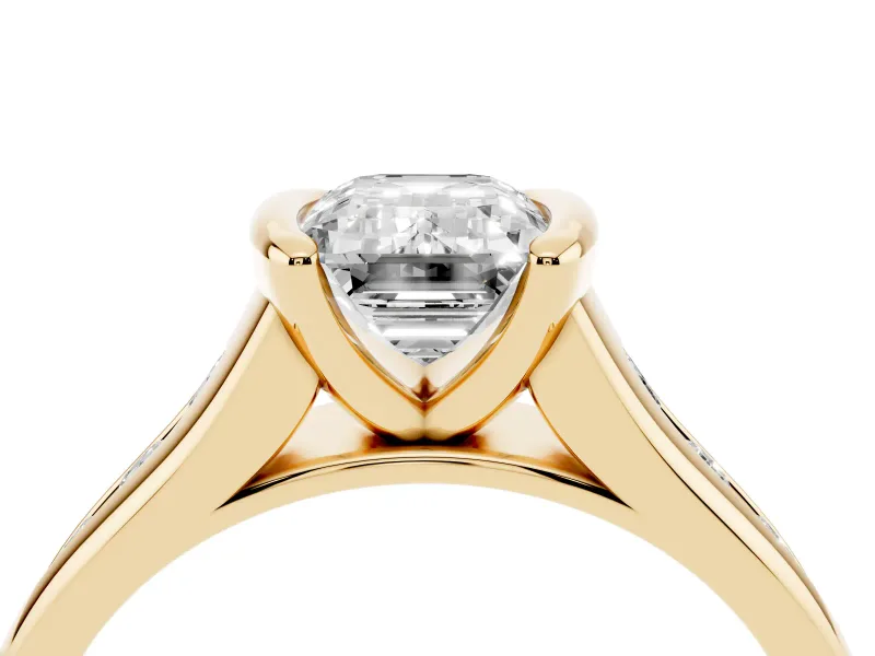 Emerald Cut Half Bezel Solitaire Engagement Ring Setting | Graduated Channel Band | Yellow Gold