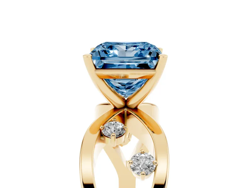 Fancy Blue Princess Cut Diamond Solitaire Ring Set in Yellow gold with Side Stones on Criss-Cross Band and Prong Setting
