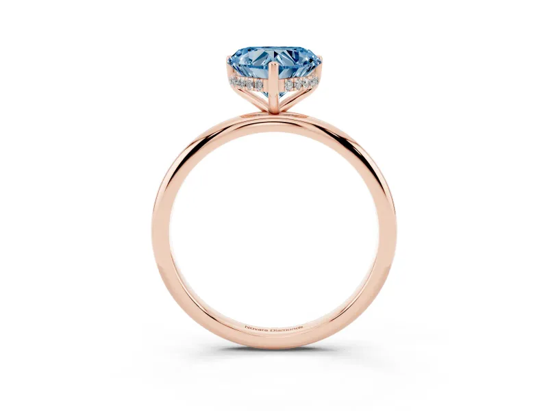 Fancy Blue Heart Cut Diamond Solitaire Engagement Ring Set in Rose gold with Prong Setting and Polished Band