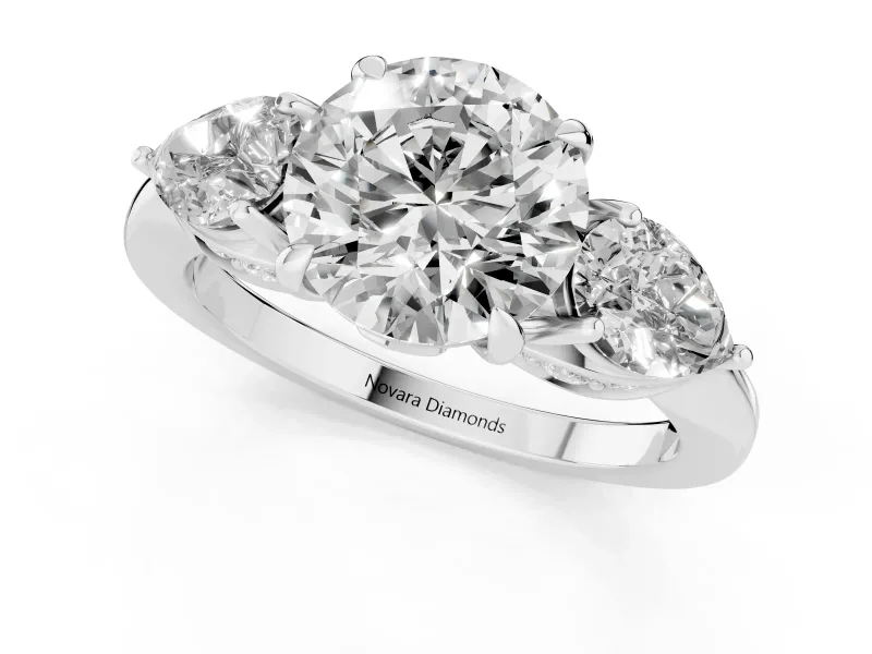 Round Cut Diamond Three-Stone Ring Set in Silver with Pear Side Stones