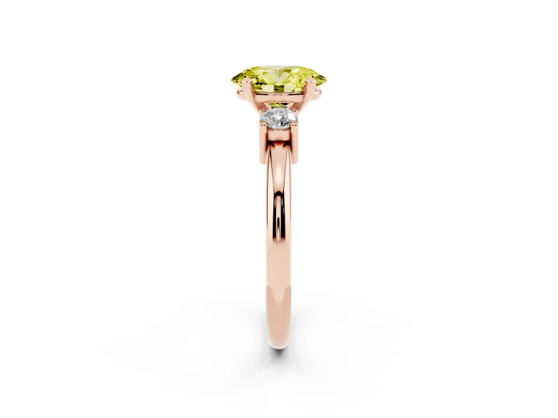 Fancy Yellow Three-Stone Oval Cut Diamond Ring Set in Rose gold with Prong Setting and Plain Band