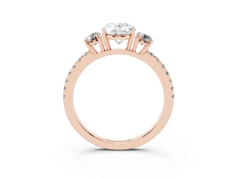 Oval Cut Diamond Three-Stone Ring Set in Rose gold with Pavé Band and Graduated Sides