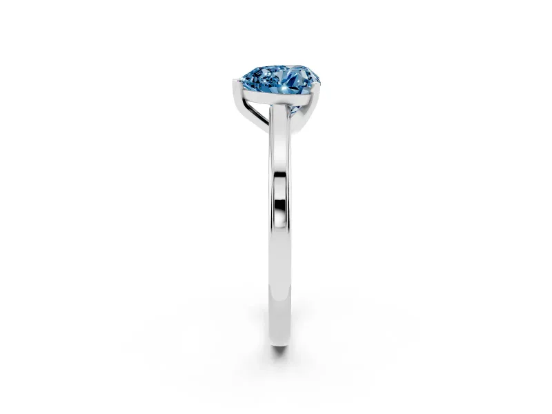 Fancy Blue Heart Cut Diamond Solitaire Ring Set in Silver with Prong Setting and Classic Band