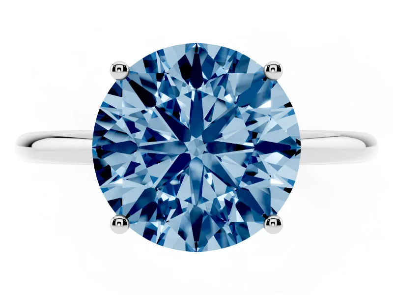 Fancy Blue Round Cut Diamond Solitaire Engagement Ring Set in Silver with Thin Band and Prong Setting