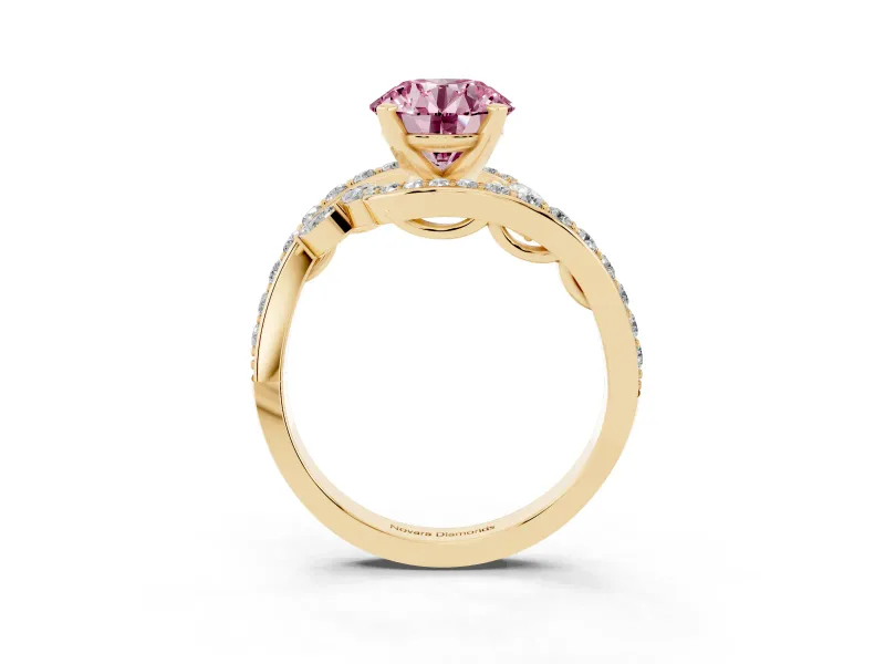 Fancy Pink Round Cut Diamond Solitaire Ring Set in Yellow gold with Pavé Twist Band and Secure Prong Setting