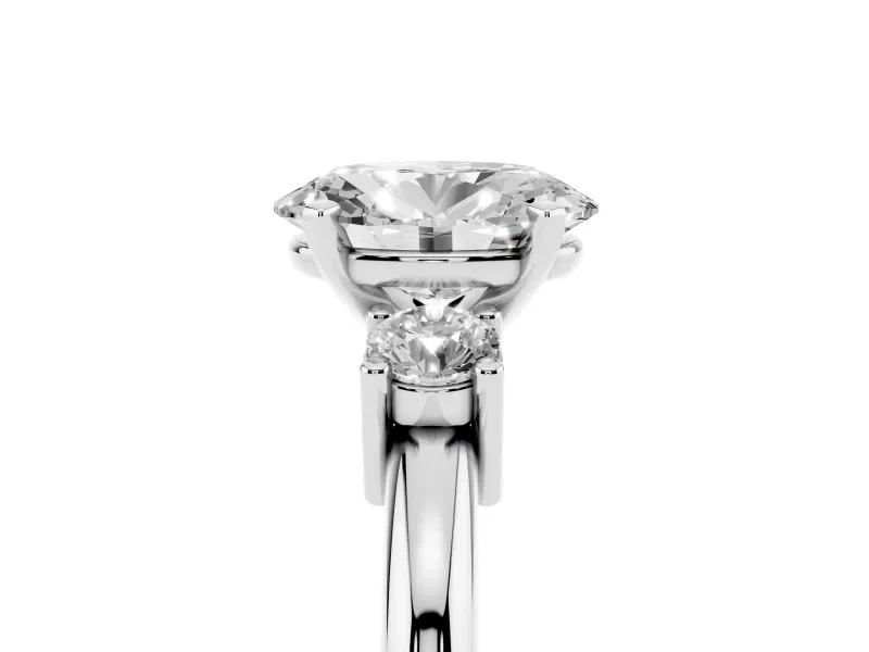 Three-Stone Oval Cut Diamond Ring Set in Silver with Prong Setting and Plain Band