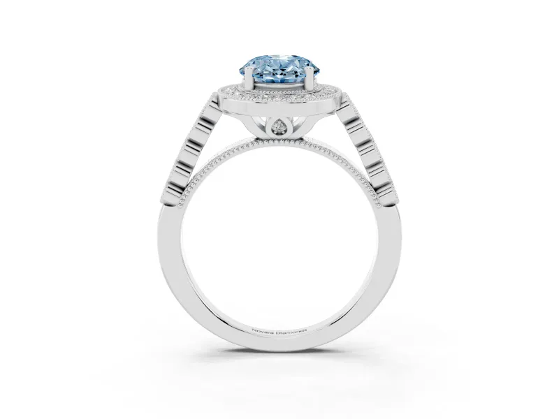 Fancy Blue Oval Cut Diamond Milgrain Halo Solitaire Ring Set in White gold with Bezel Set Side Stones and Pavé Band