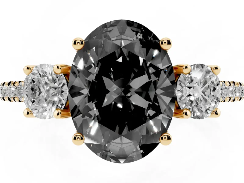 Fancy Black Oval Cut Diamond Three-Stone Ring Set in Yellow gold with Pavé Band and Graduated Sides