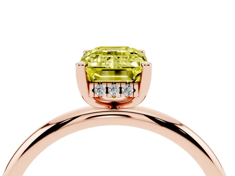 Fancy Yellow Emerald Cut Diamond Solitaire Engagement Ring Set in Rose gold with Prong Setting and Polished Band