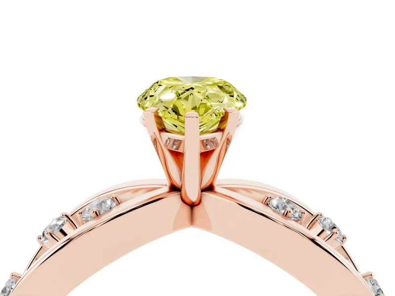 Fancy Yellow Pear Cut Diamond Solitaire Ring Set in Rose gold with Side Stones on Criss-Cross Band and Prong Setting