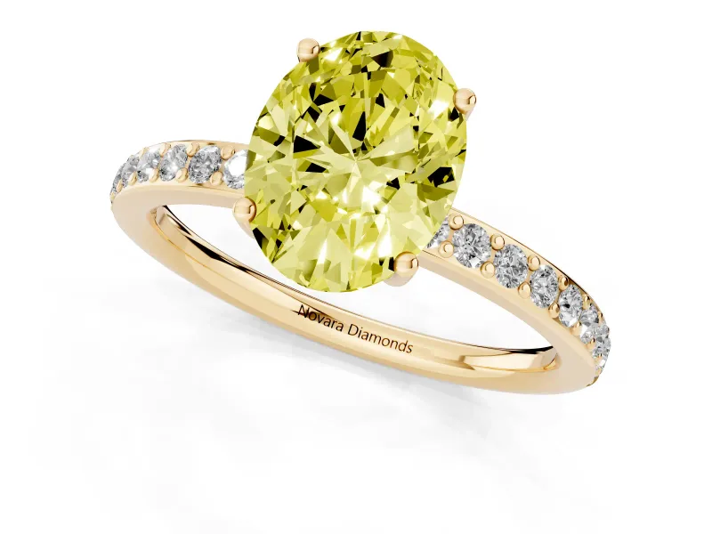 Fancy Yellow Oval Cut Diamond Pavé Band Ring Set in Yellow gold with Prong-Set Center Stone