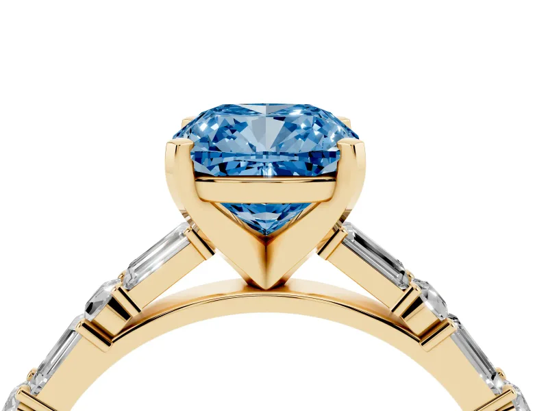 Fancy Blue Cushion Cut Diamond Solitaire Set in Yellow gold with Side Baguettes and Channel Set Band