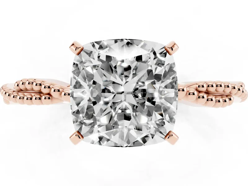 Cushion Cut Diamond Solitaire Ring Set in Rose gold with Twisted Band and Bead Prong Setting