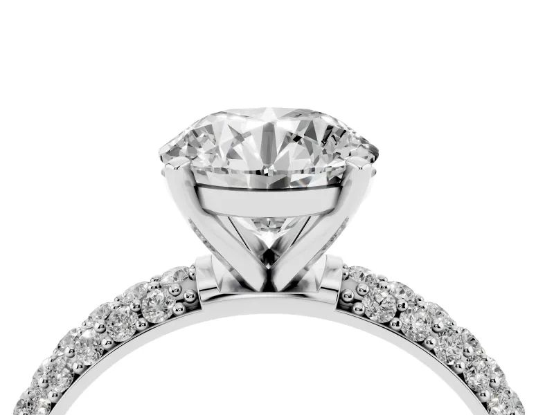 Round Cut Diamond Solitaire Ring Set in Platinum with Prong Setting and Pavé-Set Band