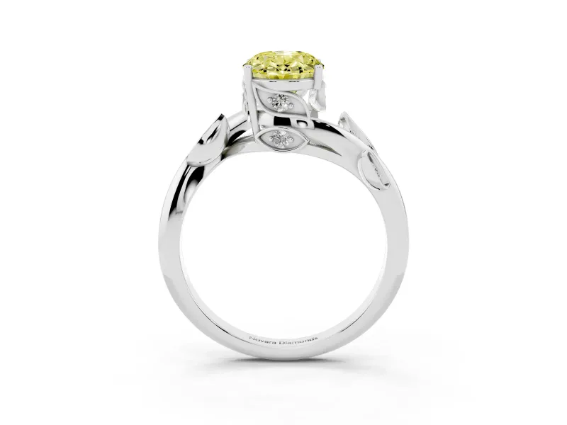 Fancy Yellow Oval Cut Diamond Solitaire Twist Engagement Ring Set in White gold with Pavé Leaf Accents