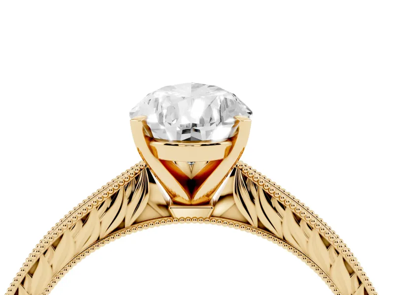 Pear Cut Diamond Solitaire Milgrain Engraved Band Set in Yellow gold with Prong Setting