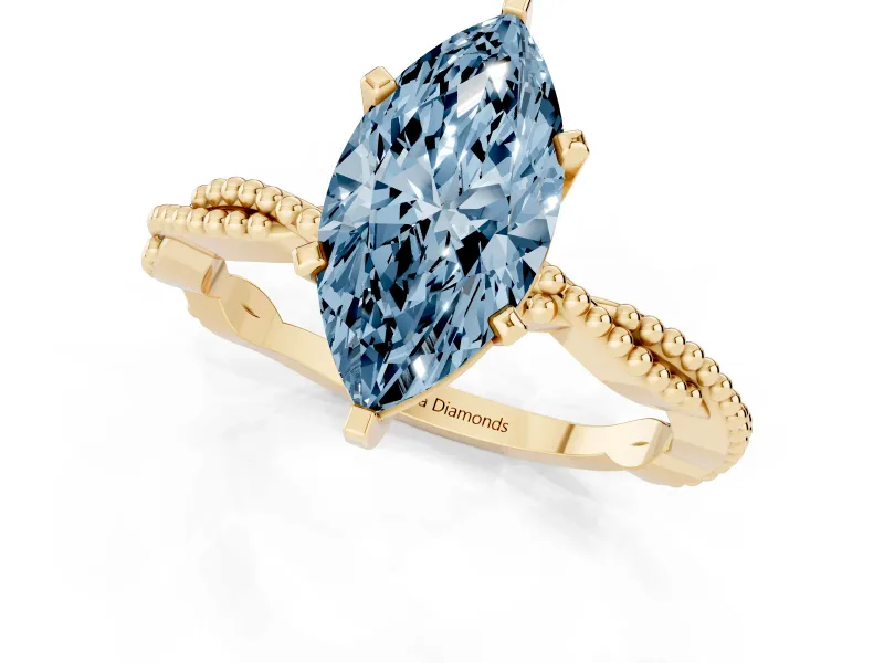 Fancy Blue Marquise Cut Diamond Solitaire Ring Set in Yellow gold with Twisted Band and Bead Prong Setting