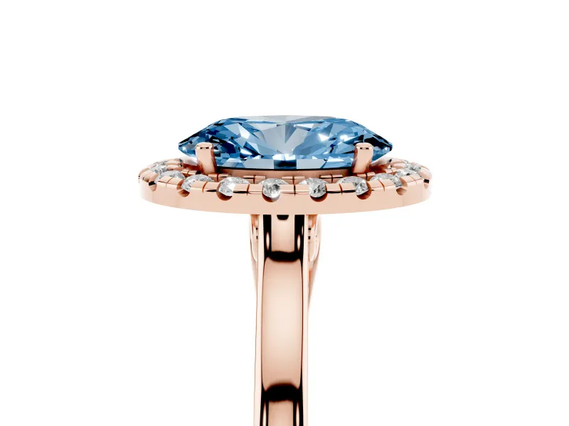 Fancy Blue Oval Cut Halo Round Diamond Solitaire Ring Set in Rose gold with Pavé Band and Prong Setting