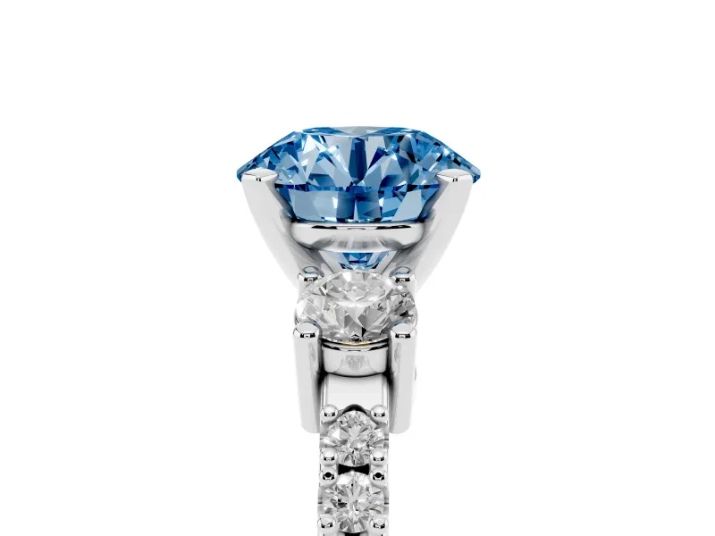 Fancy Blue Three-Stone Round Cut Diamond Pavé Band Ring Set in White gold with Prong Setting