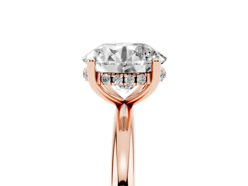 Round Cut Diamond Solitaire Engagement Ring Set in Rose gold with Prong Setting and Polished Band
