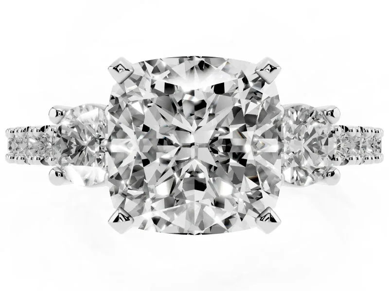 Three-Stone Cushion Cut Diamond Pavé Band Ring Set in Platinum with Prong Setting
