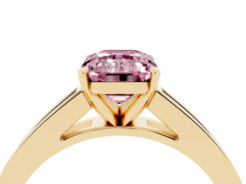 Fancy Pink Emerald Cut Diamond Solitaire Ring Set in Yellow gold with Channel-Set Band and Prong Setting