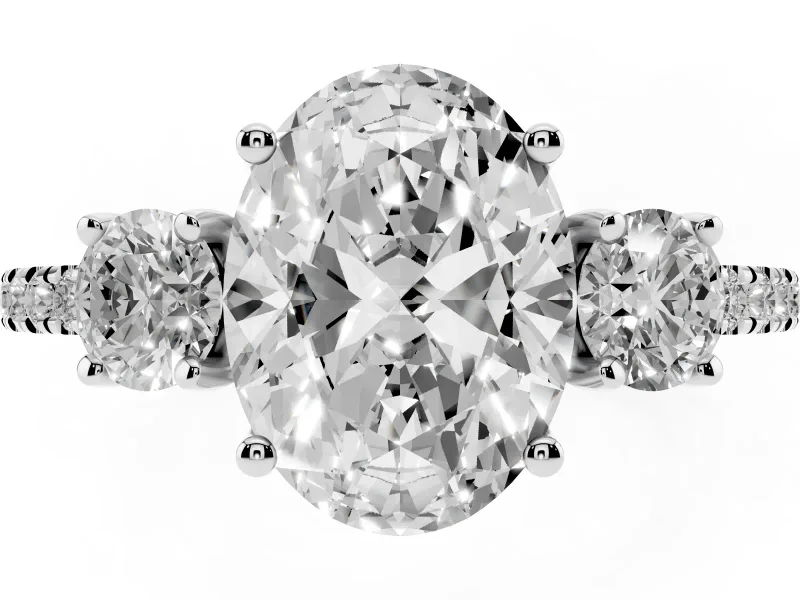 Oval Cut Diamond Three-Stone Ring Set in Silver with Pavé Band and Graduated Sides
