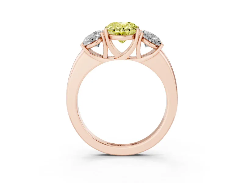 Fancy Yellow Oval Cut Diamond Three-Stone Ring Set in Rose gold with Bold Center and Classic Band