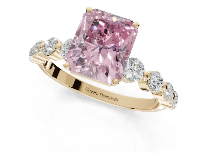 Radiant Cut Graduated Side Stone Engagement Ring Setting for a Fancy Pink Lab-Grown Diamond | Yellow Gold