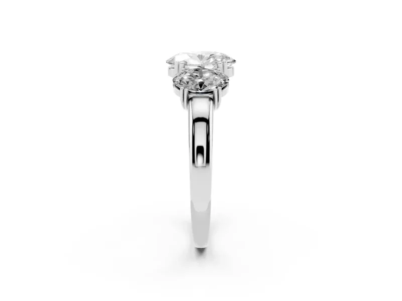Oval Cut Diamond Three-Stone Ring Set in White gold with Polished Band and Prong Setting