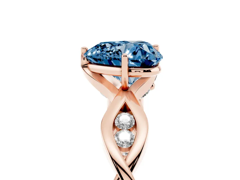 Fancy Blue Heart Cut Diamond Twist Band Solitaire Ring Set in Rose gold with Leaf Prong Setting and Accent Stones