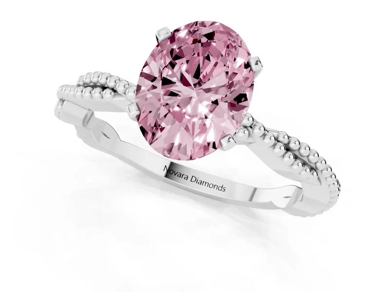 Fancy Pink Oval Cut Diamond Solitaire Ring Set in White gold with Twisted Band and Bead Prong Setting