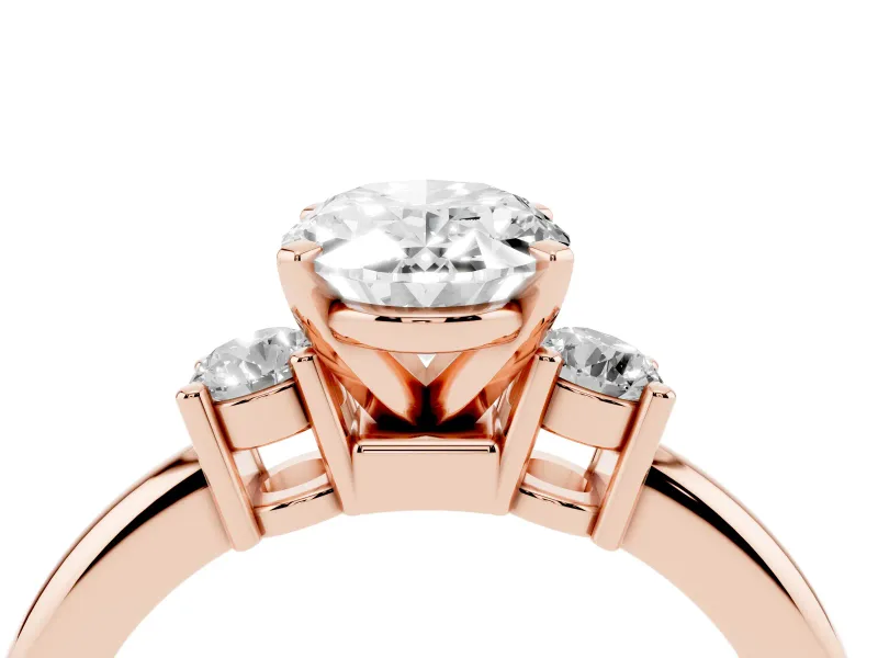 Three-Stone Oval Cut Diamond Ring Set in Rose gold with Prong Setting and Plain Band