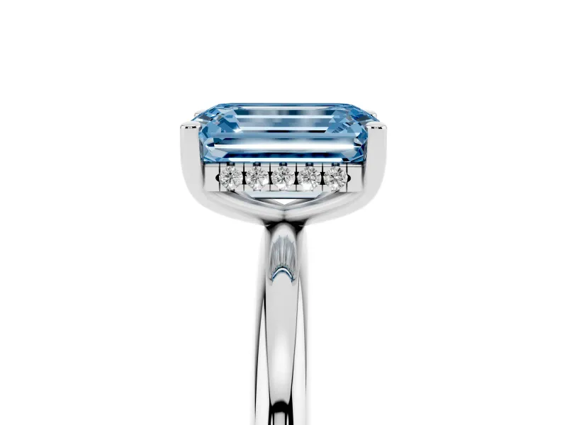 Fancy Blue Emerald Cut Diamond Solitaire Engagement Ring Set in Platinum with Prong Setting and Polished Band