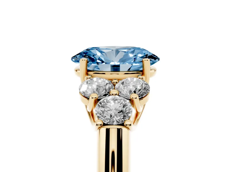 Oval Side Stone Engagement Ring Setting for a Fancy Blue Lab-Grown Diamond | Yellow Gold