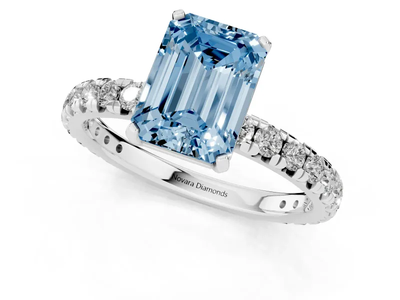 Fancy Blue Emerald Cut Diamond Pavé Solitaire Ring Set in White gold with Round Band and Prong Setting