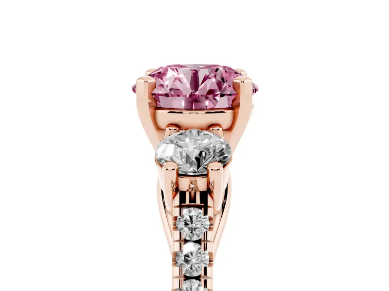 Fancy Pink Three-Stone Round Cut Diamond Pavé Band Ring Set in Rose gold with Prong-Set Trio
