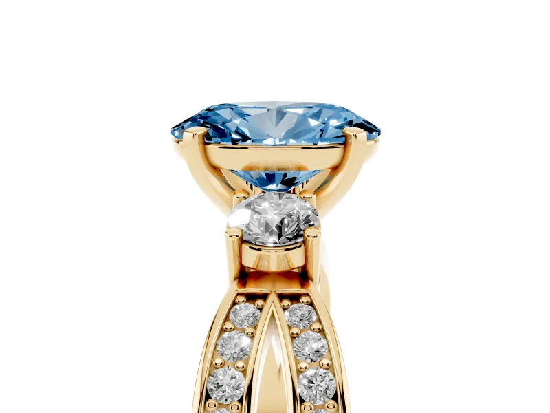 Fancy Blue Three-Stone Oval Cut Diamond Twist Band Ring Set in Yellow gold with Pavé Accents and Prong Setting