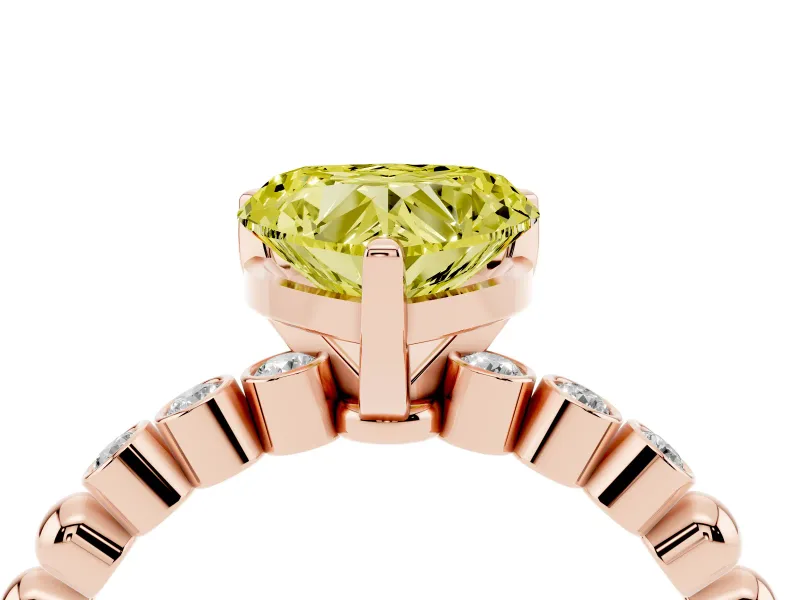 Fancy Yellow Heart Cut Diamond Solitaire Engagement Ring Set in Rose gold with Bezel Accents on Beaded Band